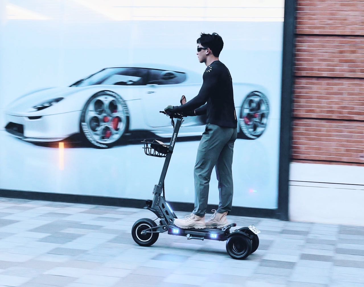 Rider using a LANGFEITE three-wheel electric scooter