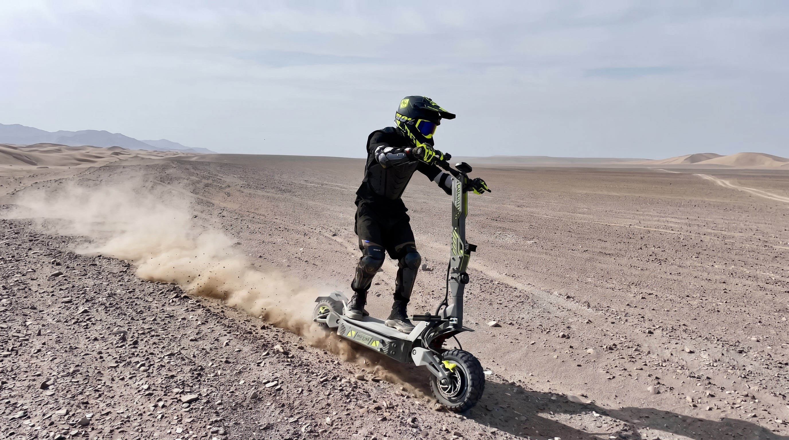 Rider carving across loose desert terrain on a LANGFEITE GT2 RS